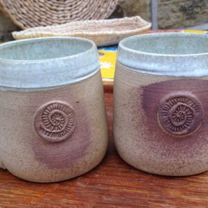 Pair of turquoise coffee mugs