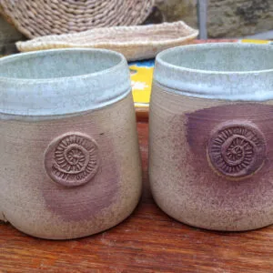 Pair of turquoise coffee mugs